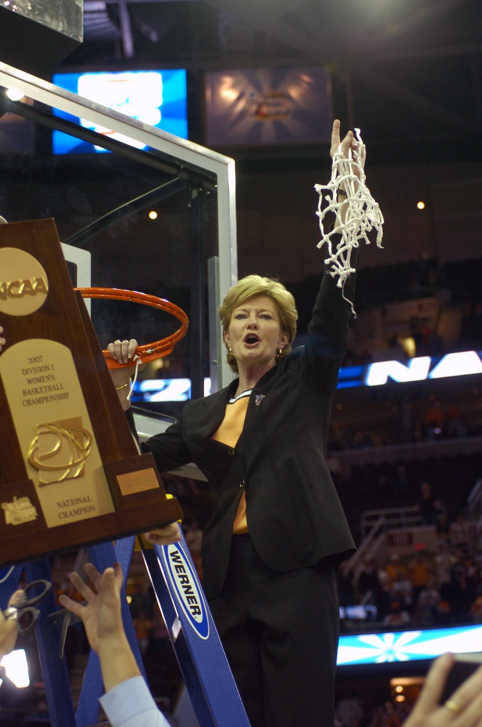 Coach Pat Summitt cutting down the net